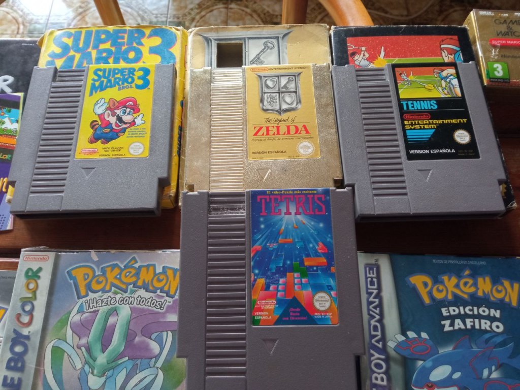 Four NES games: Super Mario 3, The Legend of Zelda, Tennis and Tetris.